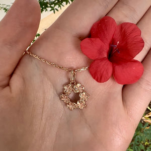 Hawaiian wreath plumeria pendant on a gold chain