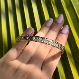 Hawaiian Heriloom bracelet with plumeria and diamonds