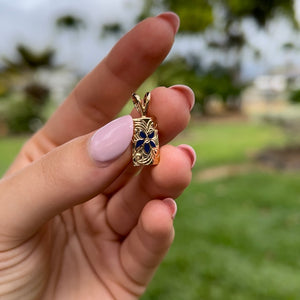 Hawaiian puanani pendant with blue enamel flower
