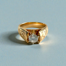 Load image into Gallery viewer, Old English & Hibiscus 8mm Tapered French Mount Solitaire Ring with 5.4mm Cubic Zirconia in 14K Yellow Gold in size 8 1/8
