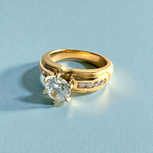 Load image into Gallery viewer, Kaimana Tapered 6mm Plumeria with Leaves Ring with 6.4mm Cubic Zirconia & Diamonds in 14K Yellow Gold in size 6 1/2