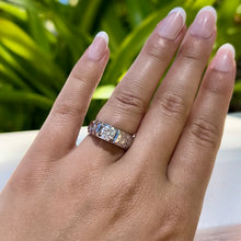 Load image into Gallery viewer, Model wearing Old English & Hibiscus 6mm French Mount Solitaire Ring in .75ct Cubic Zirconia in 14K White Gold in size 6 5/8
