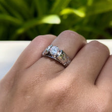 Load image into Gallery viewer, Model wearing Old English & Hibiscus 6mm French Mount Solitaire Ring in .75ct Cubic Zirconia in 14K White Gold in size 6 5/8