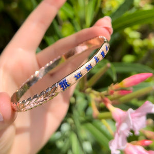 Scalloped Maile design and enamel name on Hawaiian Bracelet