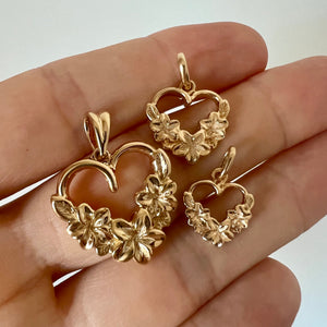 Three Hawaiian Heart Pendants with engraved plumeria flowers 