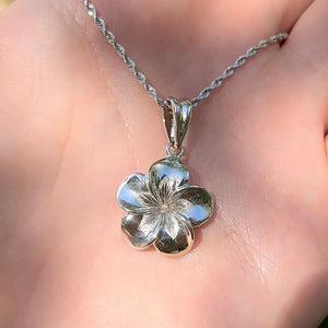 Hawaiian flower pendant on a white gold chain