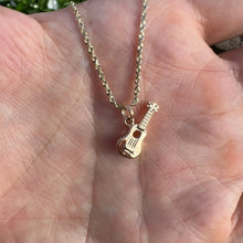 Load image into Gallery viewer, Small gold Ukulele charm pendant on a chain 
