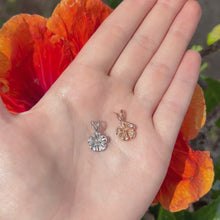 Load and play video in Gallery viewer, White and yellow gold hibiscus flower pendant