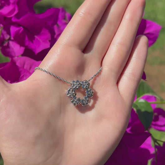 Plumerias round pendant with diamonds 