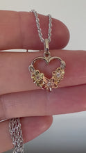 Load and play video in Gallery viewer, Heart Pendant with plumeria flowers and diamonds in multicolour gold
