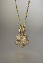 Load and play video in Gallery viewer, Small Pua’ahi (Fire Flower) Diamond Pendant in 14K Yellow Gold
