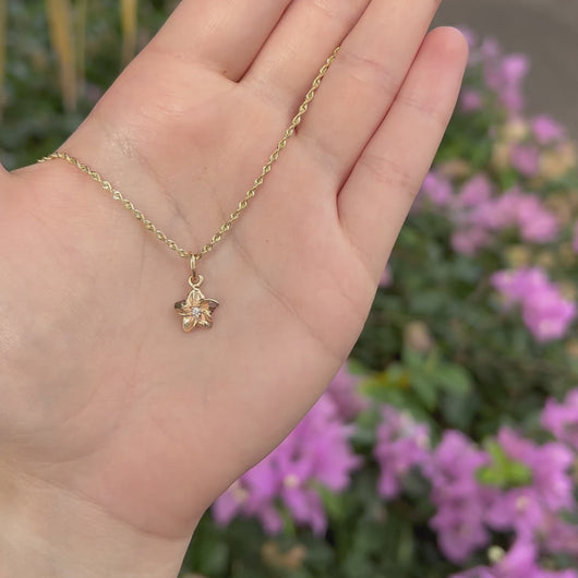 Small plumeria pendant with diamond 