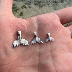 White gold whale tail pendants 