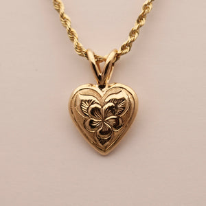 Hawaiian Jewelry Puff heart pendant with engraved plumeria flower