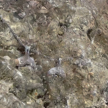 Load and play video in Gallery viewer, Whale tail pendants on a chain