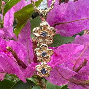 Three Vertical Plumeria Pendant with Blue Sapphire and two Alexandrites in 14K Yellow Gold