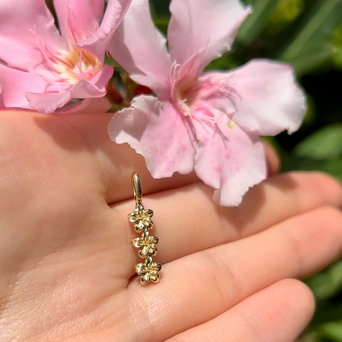 Three small plumeria flowers vertical pendant 