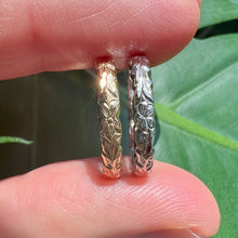 Load image into Gallery viewer, Engraving detail on gold Hawaiian rings
