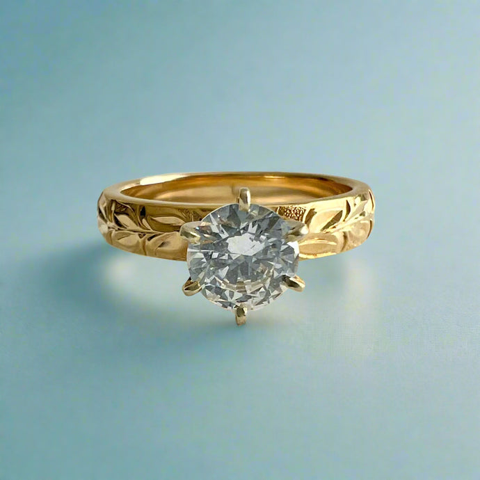Kaimana Kula Shiny Maile & Hibiscus 4mm Solitaire Ring with Cubic Zirconia in 14K Yellow Gold in size 8 1/8