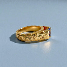 Load image into Gallery viewer, Scalloped Hibiscus 6mm Tapered French Mount Solitaire Ring with Oval Tanzanite in 14K Yellow Gold in size 6 3/4

