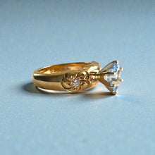 Load image into Gallery viewer, Palau Plumeria Ring with Light Blue Sapphire &amp; Diamonds in 14K Yellow Gold in size 6 1/8
