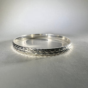 Hawaiian Bangle with maile and Flowers in Sterling Silver