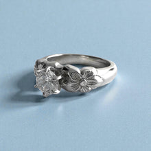 Load image into Gallery viewer, Mauloa Tapered 6mm Hibiscus Ring with 5.4mm Cubic Zirconia in 14K White Gold in size 6 3/4
