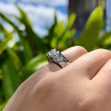 Load image into Gallery viewer, Model wearing Old English &amp; Hibiscus 6mm French Mount Solitaire Ring in .75ct Cubic Zirconia in 14K White Gold in size 6 5/8
