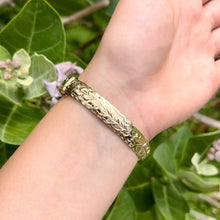Load image into Gallery viewer, Maile engraving on 10mm Hawaiian bracelet
