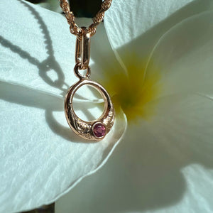 Round Hawaiian Pendant with sapphire 