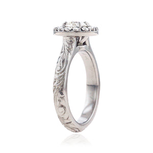 Engagement ring with Hawaiian engraving in Old English scroll design 