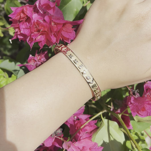 Woman's hand with Hawaiian Bracelet 