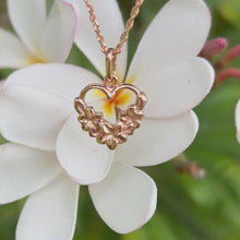Load and play video in Gallery viewer, Heart shaped Hawaiian Pendant with engraved Plumerias

