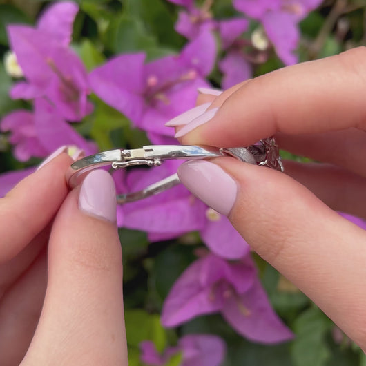 Closure mechanism on plumeria bracelet