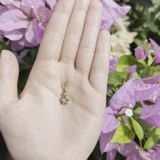 Gold plumeria pendant with diamond 