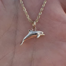 Load and play video in Gallery viewer, Dolphin charm pendant in gold
