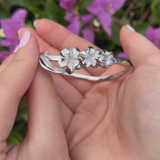 Hawaiian Bracelet with three plumeria flowers