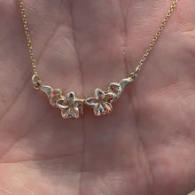 Load and play video in Gallery viewer, Two Plumeria w/ Leaf Necklace
