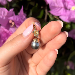 Black pearl with gold plumeria flower pendant 